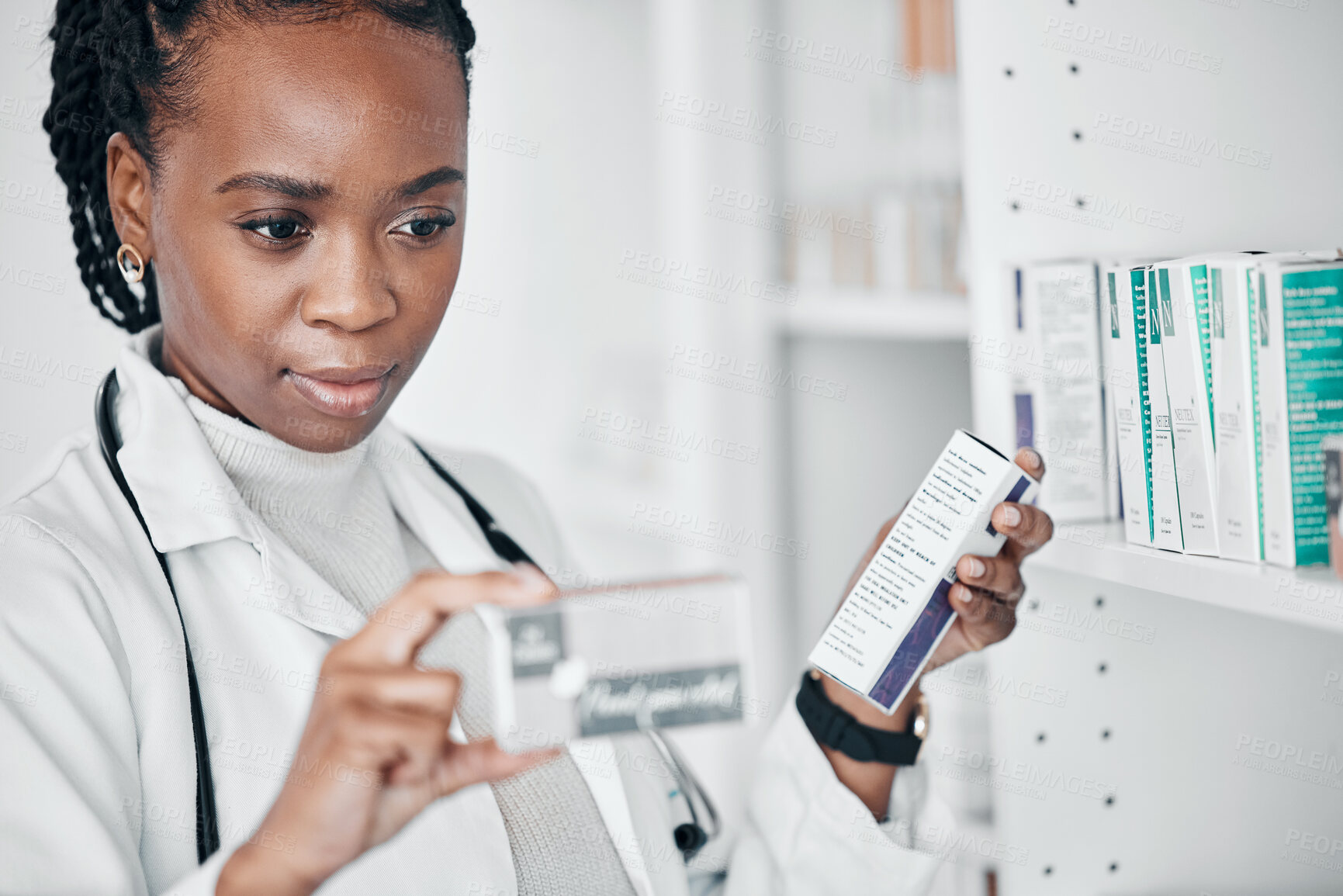 Buy stock photo Pharmacy, healthcare and black woman reading label of pills, medicine and medication for medical prescription. Wellness, pharmaceutical store and pharmacist with drugs, vitamins and supplements