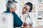 Pills, pharmacy or old woman consulting with a pharmacist for retail healthcare treatment information. Questions, trust or black woman helping a senior woman shopping for medicine or medical drugs 