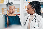 Questions, pharmacy or old woman consulting with a pharmacist for retail healthcare information. Medicine, trust or black woman helping a senior woman shopping for medication, pills or medical drugs