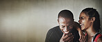 Fitness, mockup or laughter with a black couple in studio on a gray background for health and humor. Exercise, mock up or funny with a man and woman athlete laughing against a wall in the gym