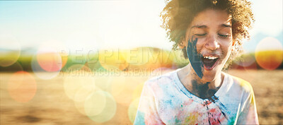 Buy stock photo Boy, outdoor and paint splash on face with mockup space by field, grass or nature for holiday in blurred background. Young happy kid, sunshine and excited smile at park, game or countryside vacation