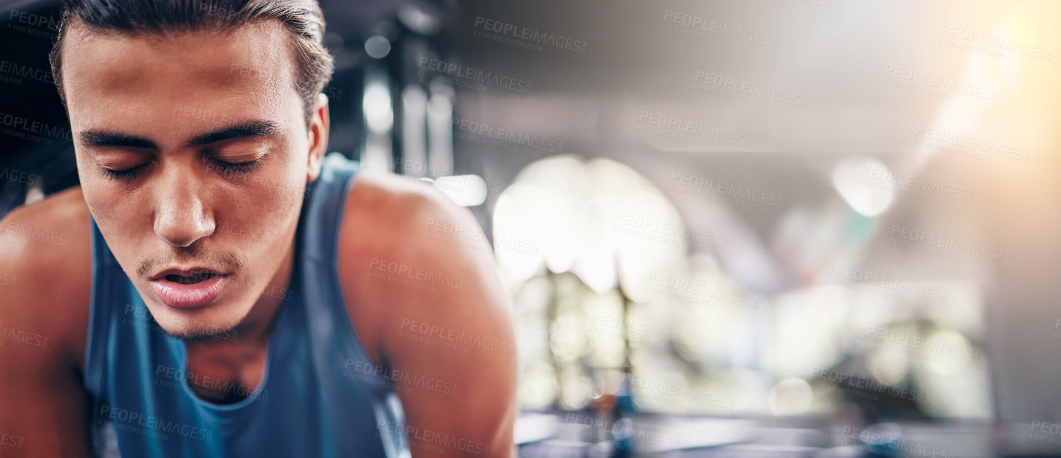 Buy stock photo Tired, man and gym for fitness, workout and intense training against bokeh background space. Exercise, break and athletic male stop for breathing, rest and exhausted from cardio,  sports or challenge