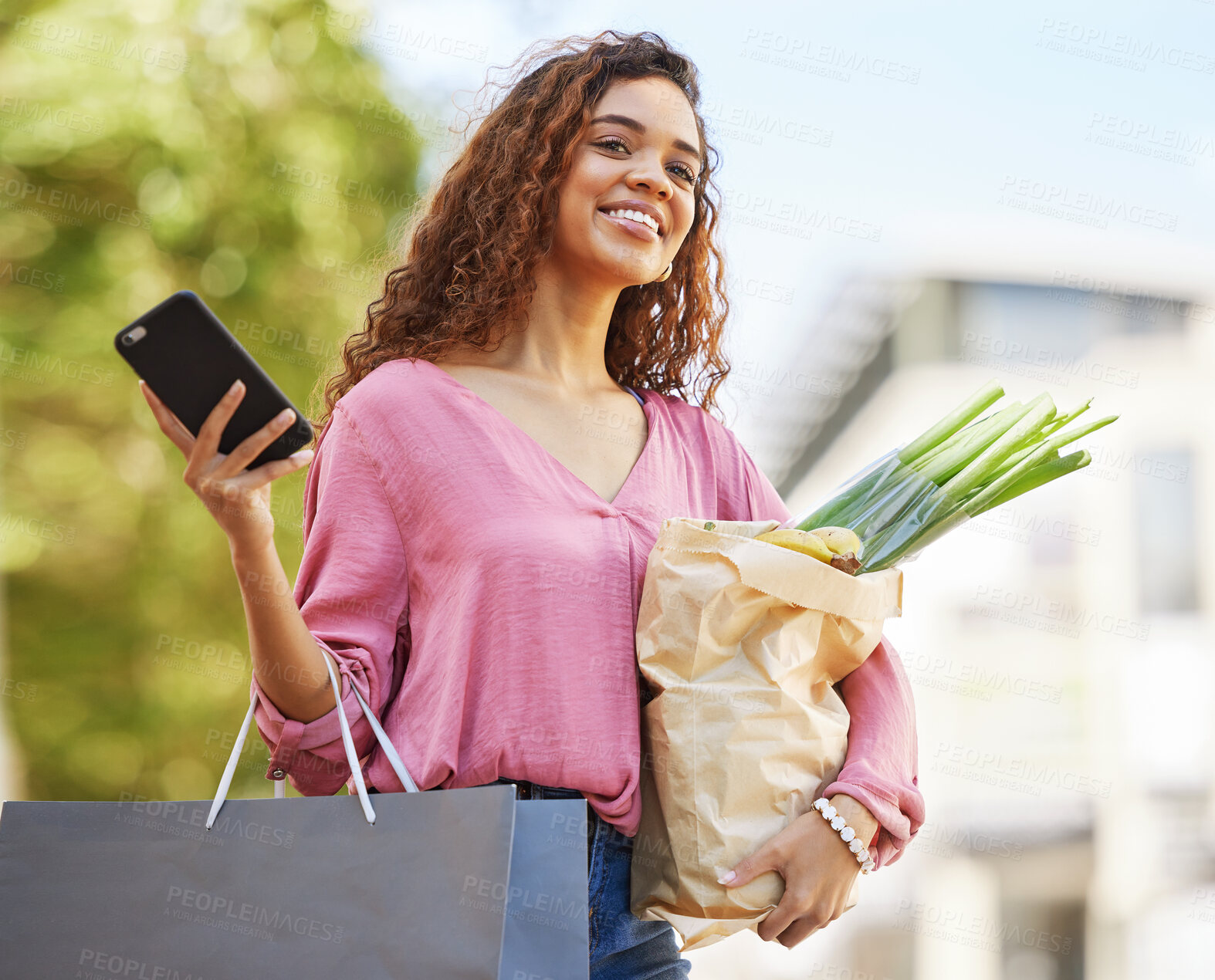 Buy stock photo Smartphone, woman and shopping with bags, outdoor and purchase groceries with smile, sale and discount items. Female shopper, customer and lady with online deals, waiting for taxi and retail products