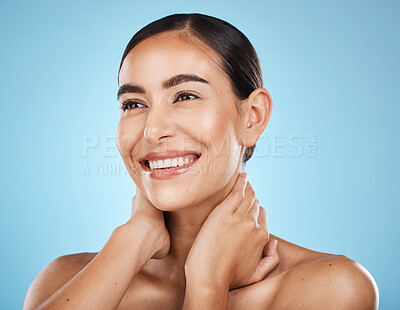 Buy stock photo Woman, face and smile, happy and facial with natural cosmetics and beauty isolated against blue background. Clean, cosmetic care and hands with glow, makeup and healthy skin with skincare in studio