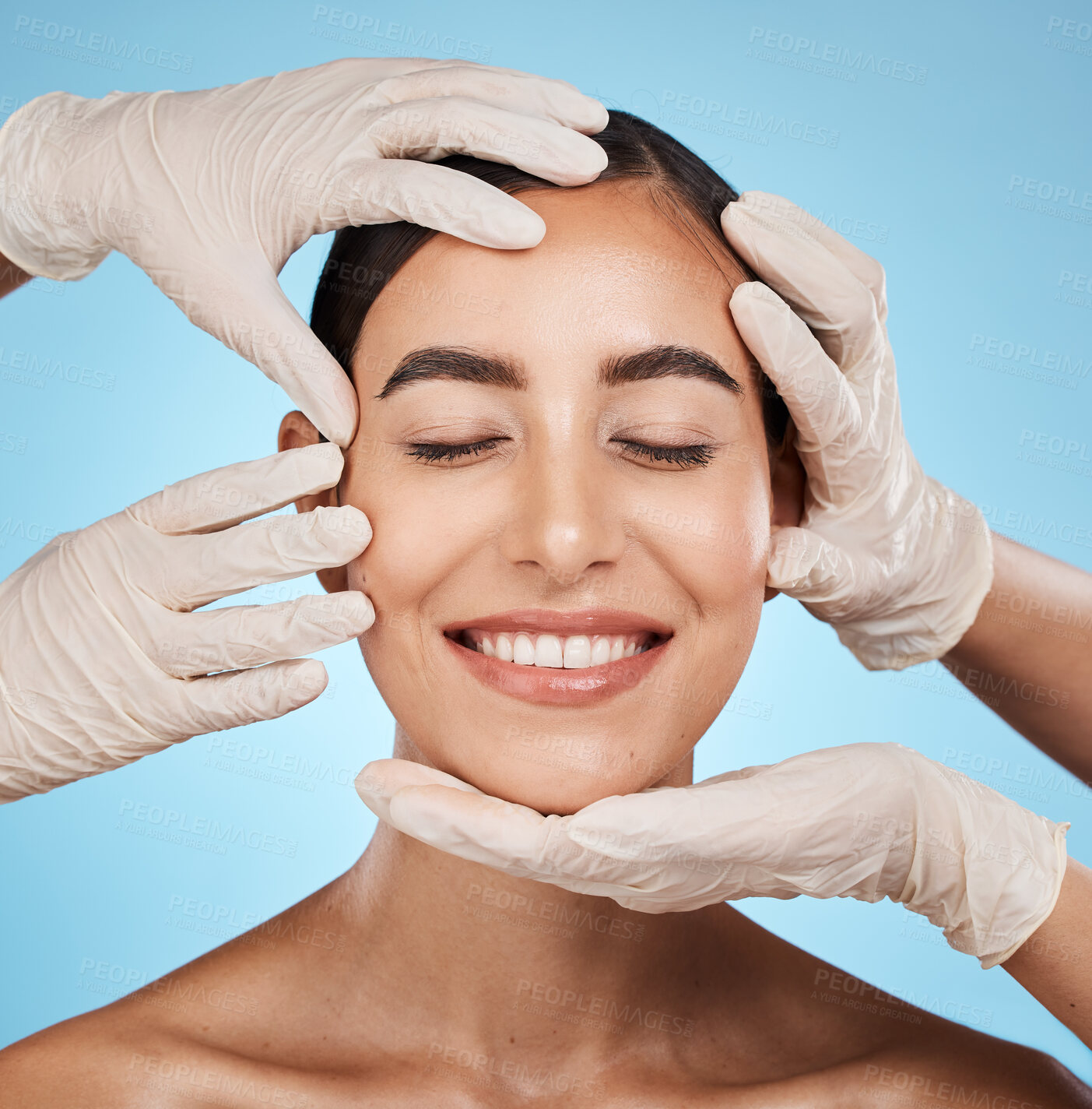 Buy stock photo Plastic surgery, beauty and woman in a studio for a skincare, natural and cosmetic facial treatment. Cosmetics, self love and surgeon hands on a female model face for consultation by blue background.