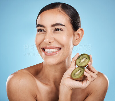 Buy stock photo Kiwi, beauty and woman isolated on studio background for natural skincare, cosmetics and facial product on mockup. Healthy, organic and happy model or person fruits for face or dermatology vitamin c