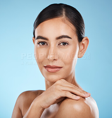 Buy stock photo Portrait, face and beauty skincare of woman in studio isolated on a blue background. Aesthetics, makeup and cosmetics of female model with healthy, glowing or flawless skin after spa facial treatment
