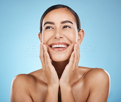 Buy stock photo Face, beauty and skincare of woman in studio isolated on a blue background. Aesthetics, makeup and cosmetics of happy female model with healthy, glowing and flawless skin after spa facial treatment.