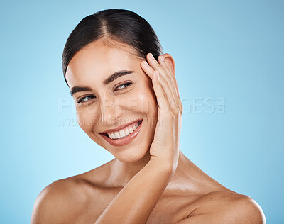 Buy stock photo Woman, face and smile, happy and skin with natural cosmetics and beauty isolated against blue background. Clean, cosmetic care and hand with facial, makeup and healthy glow with skincare in studio