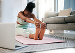 Yoga, stretching and woman in online class for fitness, pilates training and home learning on laptop. Meditation, workout and holistic person in living room with computer video or webinar for balance