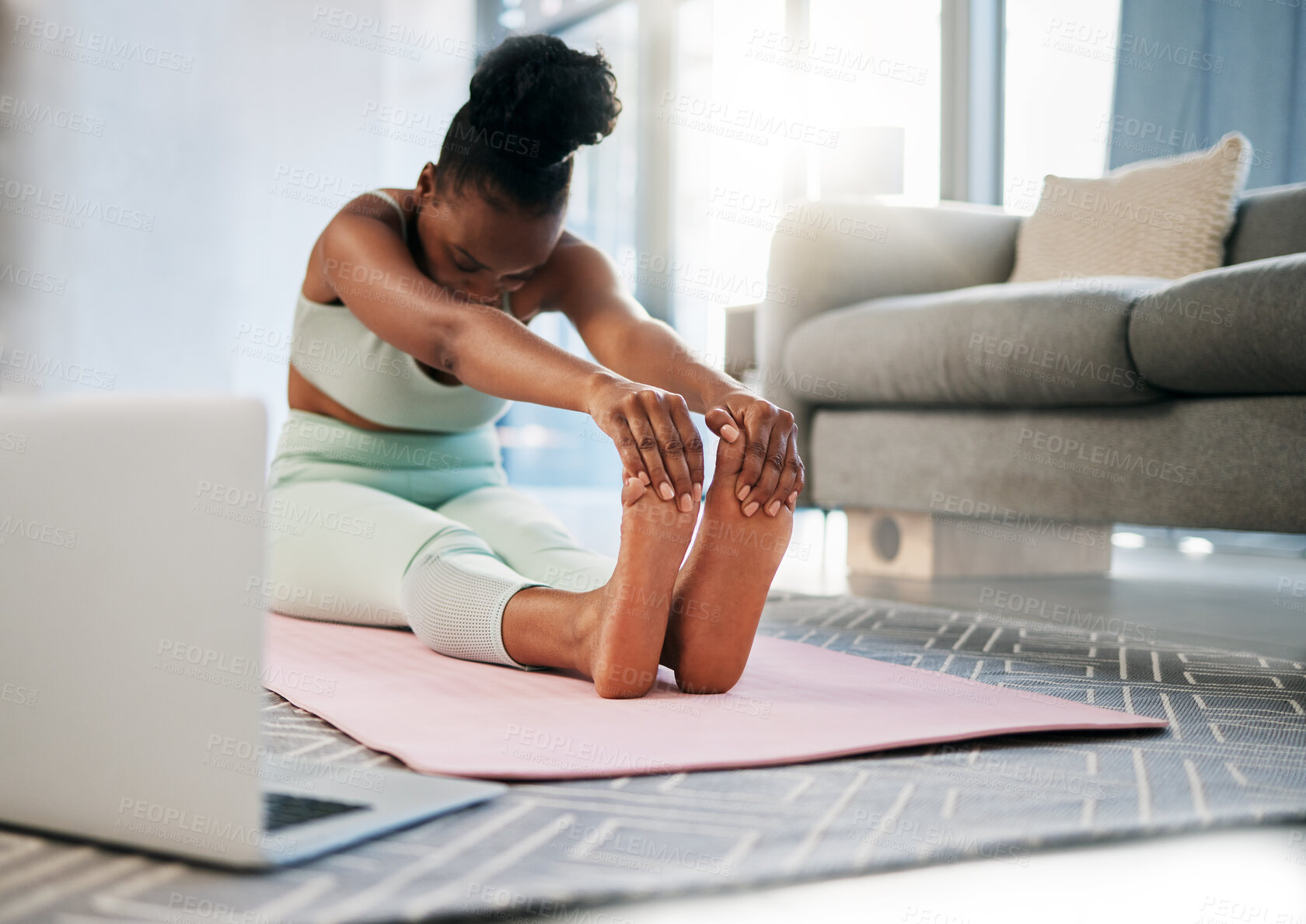 Buy stock photo Yoga, stretching and black woman in online class for fitness, pilates training and home learning on laptop. Meditation, workout and person in living room with computer video or webinar for balance