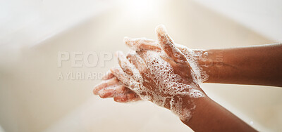 Buy stock photo Washing hands, soap and water for cleaning, hygiene and wellness in bathroom lens flare. Liquid, hand or skin care for bacteria, germs or virus protection in sink for healthcare and safety background