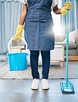 Cleaning, bucket and mop with feet of women in living room for hygiene, sanitary and disinfection.  Chores, cleaner and maintenance with girl with container for bacteria, chemical or sanitize routine