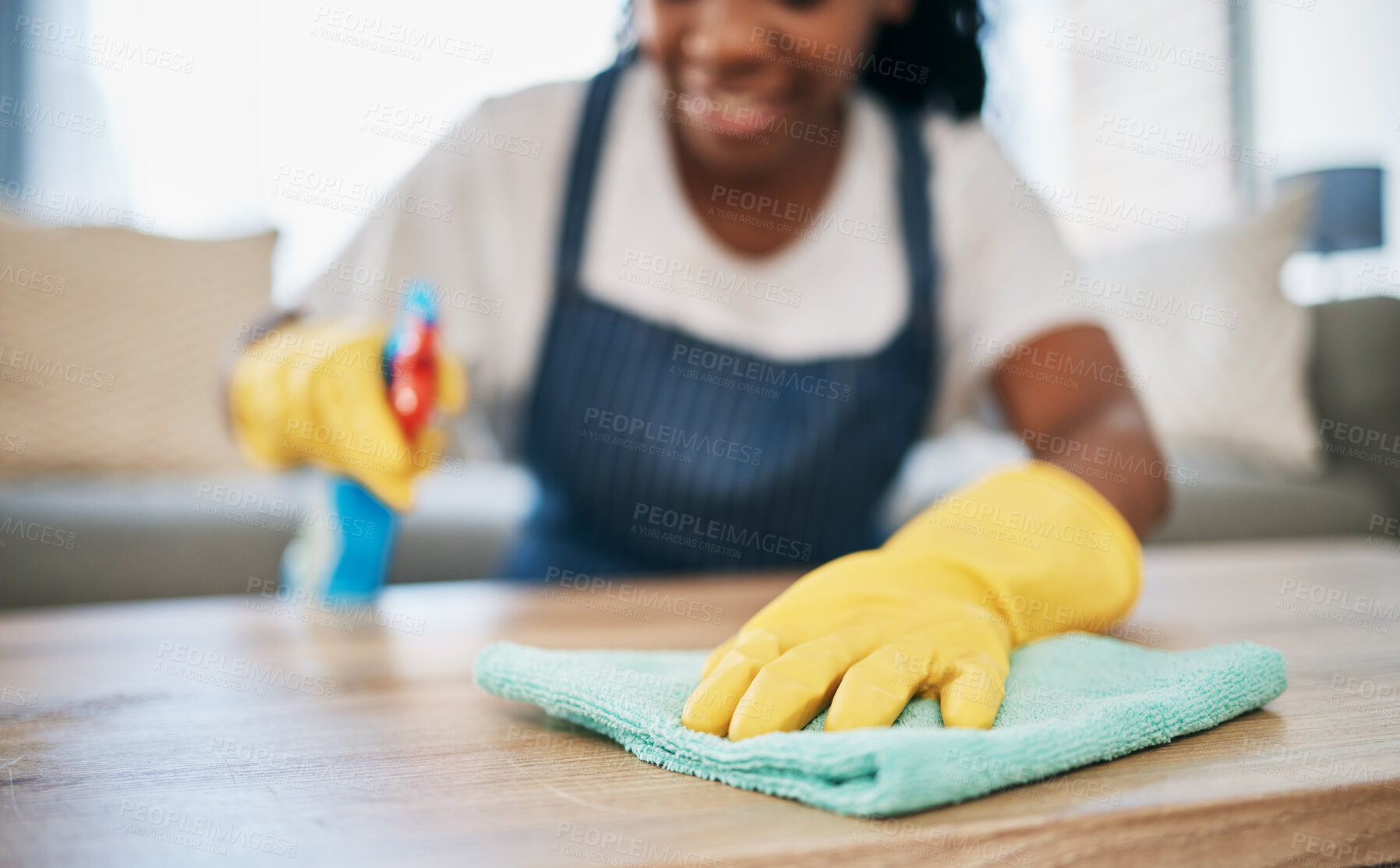 Buy stock photo Hand, cloth and gloves with a black woman cleaning a home for hygiene as a housekeeper or maid. Furniture, bacteria and chemical with a female cleaner working in housekeeping in an apartment