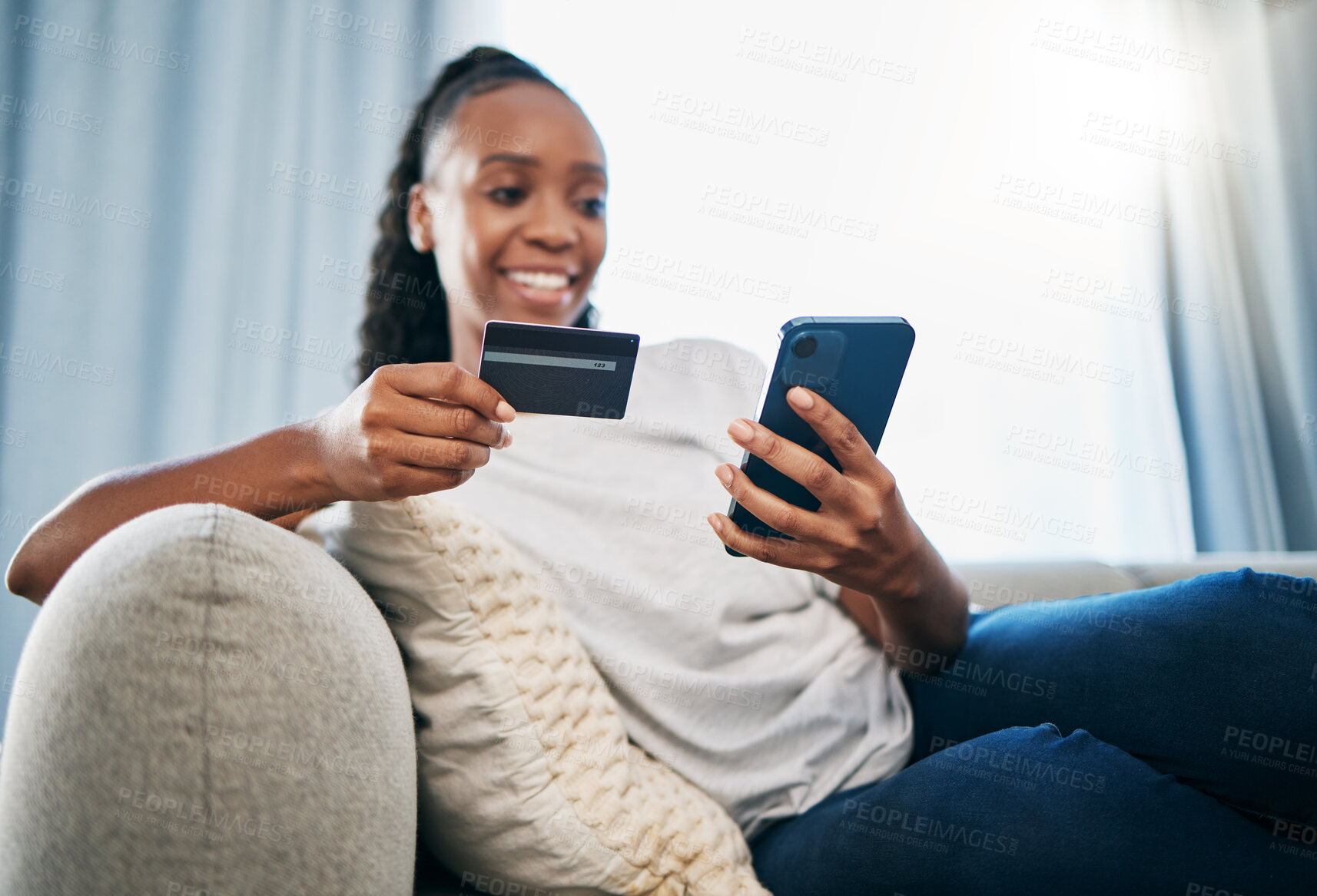 Buy stock photo Credit card or black woman with phone for online shopping or payment, internet purchase or ecommerce in living room. Fintech, happy or girl on smartphone for trading, banking or invest on home sofa