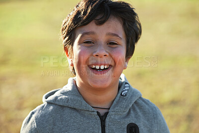 Buy stock photo Happy, smile and portrait of a child in nature having fun while enjoying outdoor fresh air. Happiness, excited and face of a boy kid standing in a park while on a summer vacation, holiday or trip.