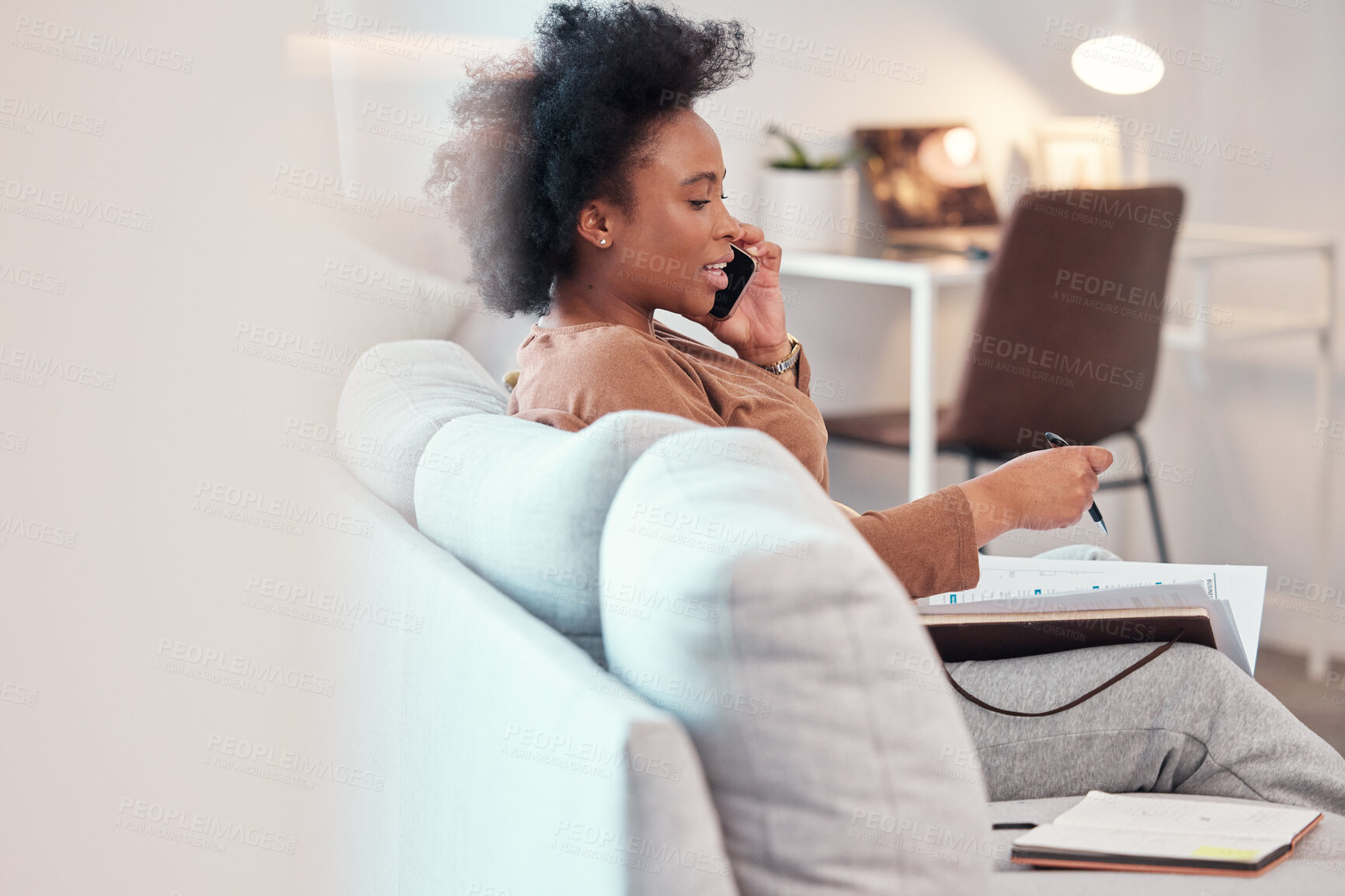 Buy stock photo Student, learning and black woman on a phone call talking, planning or schedule her work in a home, house or apartment. College, university or young person on a mobile discussion about education