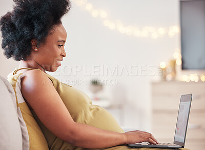 Buy stock photo Pregnant, laptop and black woman on sofa typing at home working on a freelance business project. Computer, pregnancy and female remote worker writing report while relaxing on couch in living room.