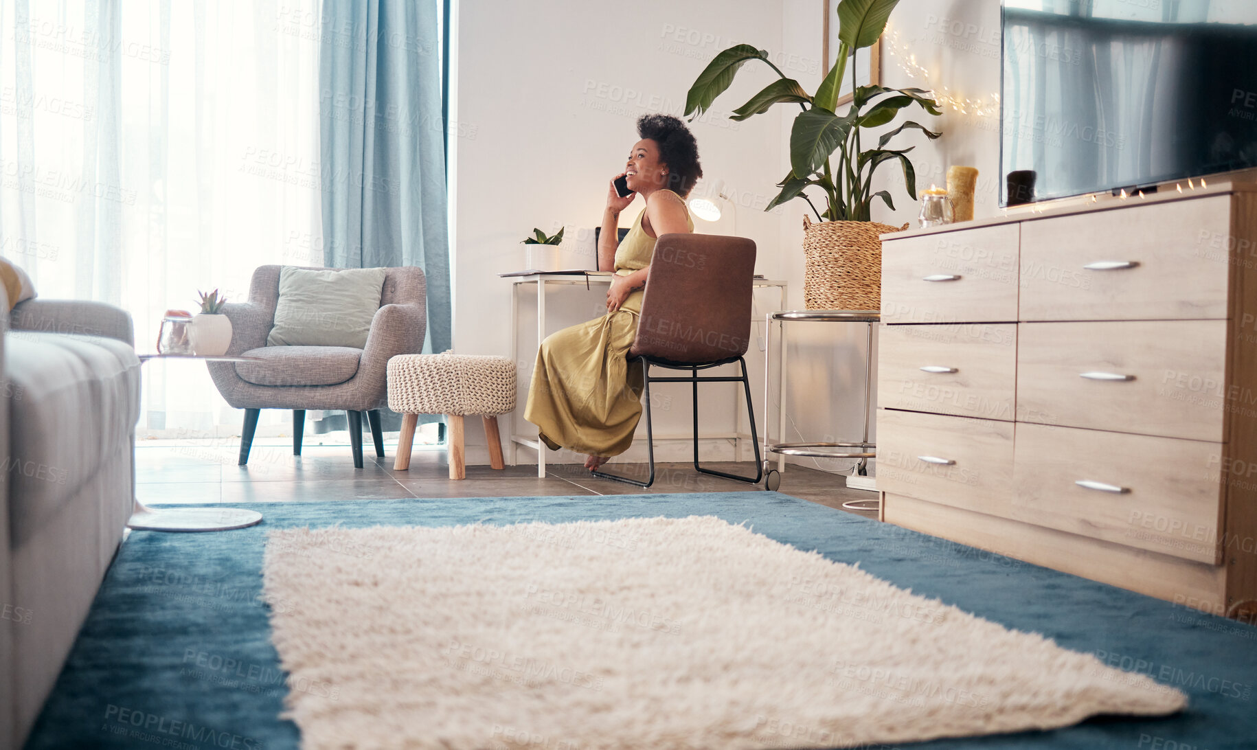 Buy stock photo Black woman in lounge, phone call and conversation for planning, happiness and peace at home. African American female, lady and smartphone with smile, talking and discussion with carefree and relax