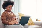 Pregnancy, laptop and black woman on a sofa working from home on a freelance business project. Confused, computer and African pregnant female freelancer planning report while relaxing in living room.