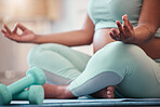 Pregnant black woman, lotus hands and yoga meditation in home for mindfulness, wellness and health. Zen chakra, pregnancy and future mom or mother meditating, training or practicing pilates in house.