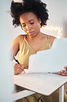 Planning, paperwork and black woman writing a budget, working on tax and home accounting. Finance, loan and African girl with documents for payment, contract and entrepreneurship business investment