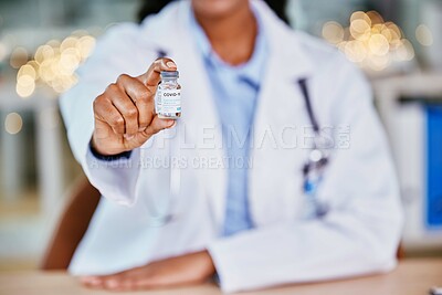 Buy stock photo Covid, vaccine and doctor hands for healthcare solution, compliance and policy in office bokeh. Hospital, clinic or pharmacy professional with corona virus in liquid container or product background