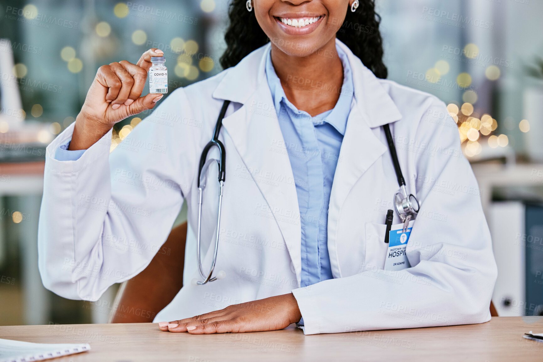 Buy stock photo Covid, vaccine and happy doctor for healthcare solution, compliance and insurance in office bokeh. Hospital, clinic or pharmacy black woman with corona virus in liquid bottle or product background