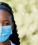 Covid, nurse and portrait at hospital with mask for compliance, safety and healthcare on bokeh background. Face, corona and female health expert at a clinic for help, goal and innovation outside