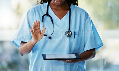 Buy stock photo Healthcare, tablet and doctor with stethoscope in hospital checking results after a consultation. Medical, technology and African female nurse with a mobile device for research in a medicare clinic.