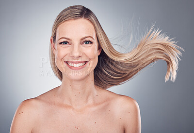 Buy stock photo Woman in portrait, face with hair in air, beauty and keratin treatment, cosmetic care with smile isolated on studio background. Happy model, glow and hairstyle shine, natural cosmetics and skincare