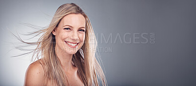 Buy stock photo Beauty, hair care and woman portrait with space for mockup in studio with natural makeup cosmetics. Face of aesthetic model person on a grey background for hairdresser or salon shampoo for shine