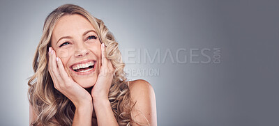 Buy stock photo Beauty, happy and face of woman excited for cosmetics product placement, luxury makeup mockup or skincare glow. Dermatology mock up, spa studio or laughing promotion model isolated on grey background