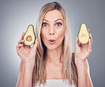 Avocado, beauty and skin or hair care woman portrait in studio with natural cosmetic and shampoo shine. Face of aesthetic model excited on grey background for hairdresser or wow sustainable product