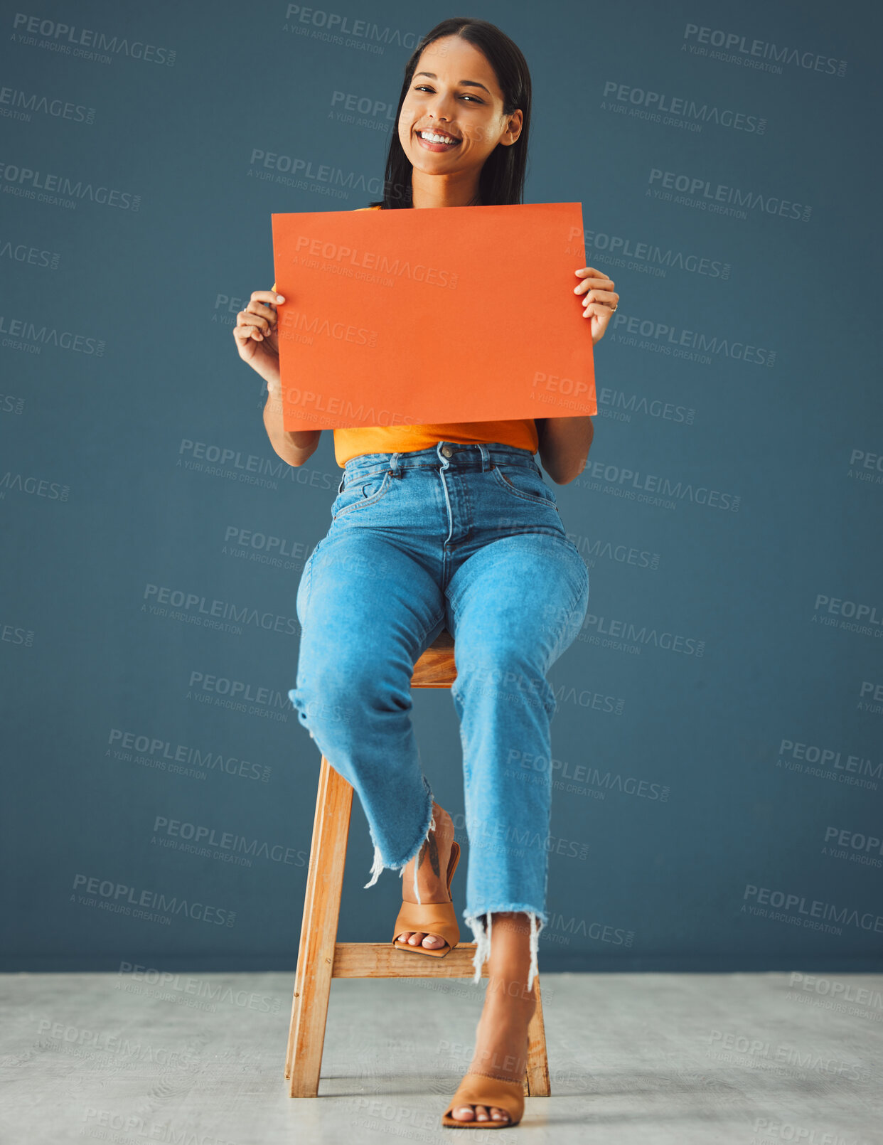 Buy stock photo Woman, banner portrait and mockup poster space for sale, discount or promotion. Happy model with advertising for product placement, logo or branding on billboard, orange paper sign, studio background