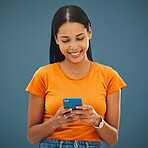 Texting, message and phone by woman on social media, mobile or app browsing a website, web or internet. Happy, smiling and female with notification chatting or typing online send an email