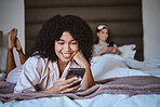 Contact, phone and smile with black woman at sleepover for communication, internet or online dating. Happy, relax and texting with girl and friends in bedroom with technology, digital or social media