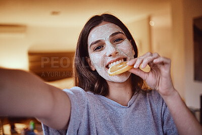Buy stock photo Selfie, portrait and woman eating orange during skincare, beauty and grooming in bedroom, happy and smile. Face, vitamin c and girl influencer relax with fruit facial, mask or detox treatment at home