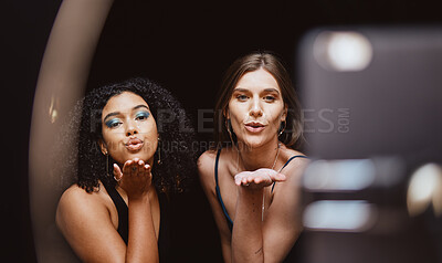Buy stock photo Beauty, fashion and woman friends blowing a kiss together while recording a vlog as an influencer team. Social media, makeup and affection with a female and friend live streaming a broadcast