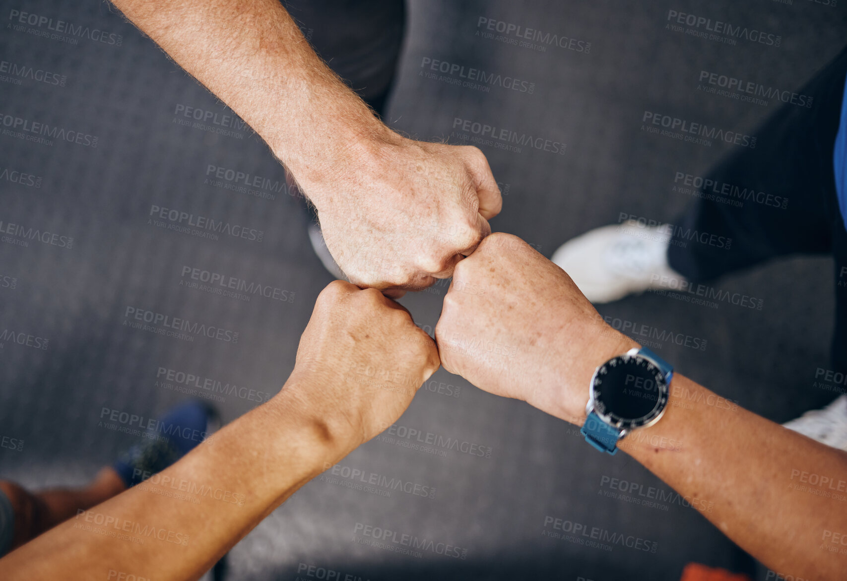 Buy stock photo Fist bump, motivation in workout in gym, training or exercise for strong muscles, healthcare or wellness. Top view, hands or men support in teamwork, collaboration or community in fitness diversity