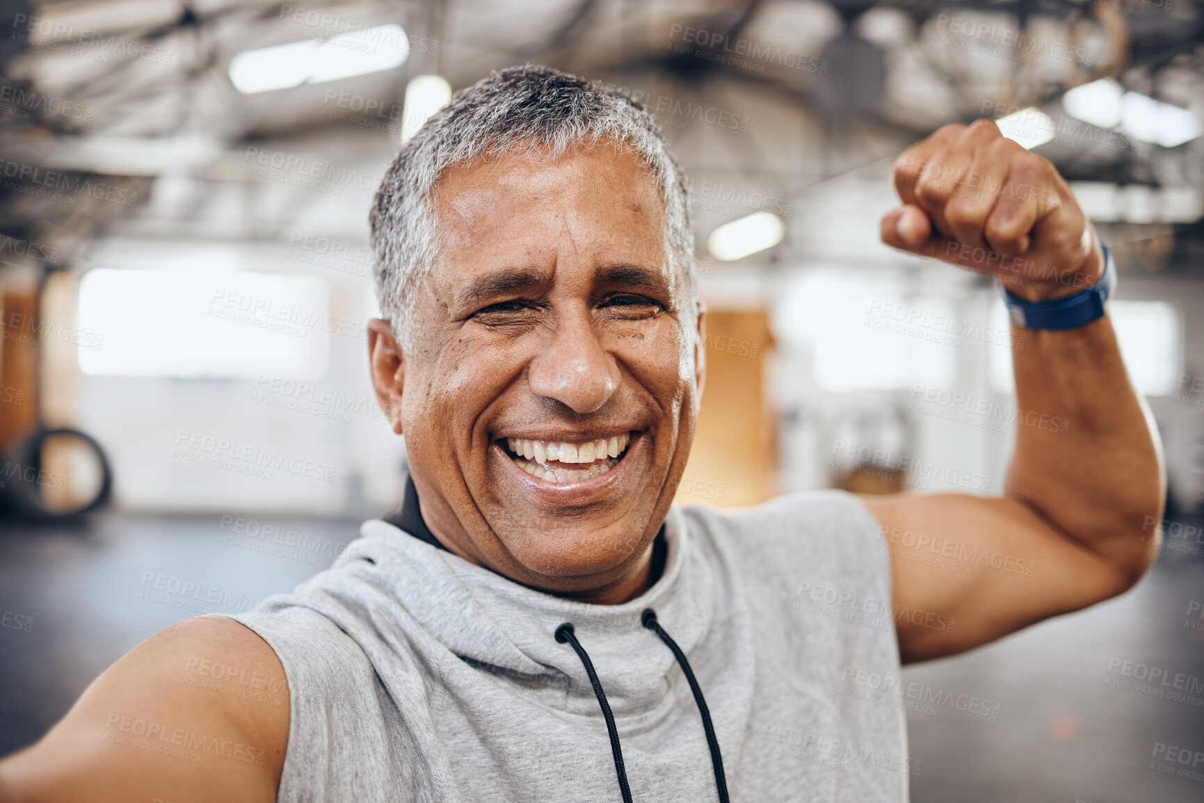 Buy stock photo Muscle, exercise and selfie portrait of old man in gym show biceps for motivation, wellness and cardio workout. Smile, healthy body and face of senior male after training, sports and fitness goals