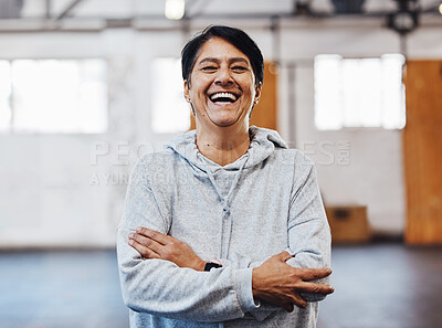 Buy stock photo Arms crossed, laughing and portrait of a woman in the gym for fitness, training and exercise. Motivation, happy and funny mature athlete with cardio vision, workout smile and confidence in sports