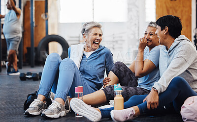 Buy stock photo Gym, laughing and group of mature women telling joke after fitness class, conversation and comedy on floor. Exercise, bonding and happy senior woman with friends sitting chatting together at workout.