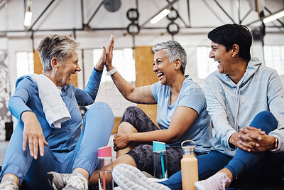 Group Of Active Senior People Talking After Training Stock Photo