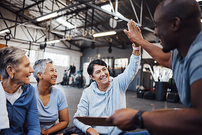Buy stock photo Senior women, fitness and personal trainer high five for health, routine and workout at a gym. Exercise, elderly and friends with health coach man hands connecting in support of goal collaboration