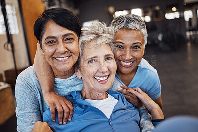 Buy stock photo Mature women, portrait and hug in gym, workout or training healthcare wellness, bonding activity or exercise class. Smile, happy and retirement fitness friends in diversity group or community support