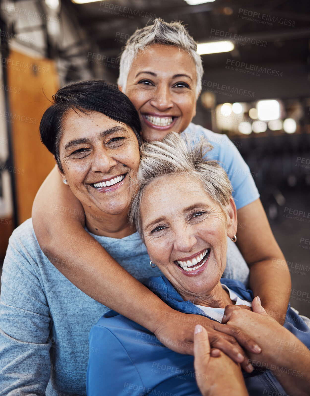Buy stock photo Mature women, portrait or hug in training, workout or gym for healthcare wellness, bonding goals or exercise class. Smile, happy or retirement fitness friends in diversity group or community support