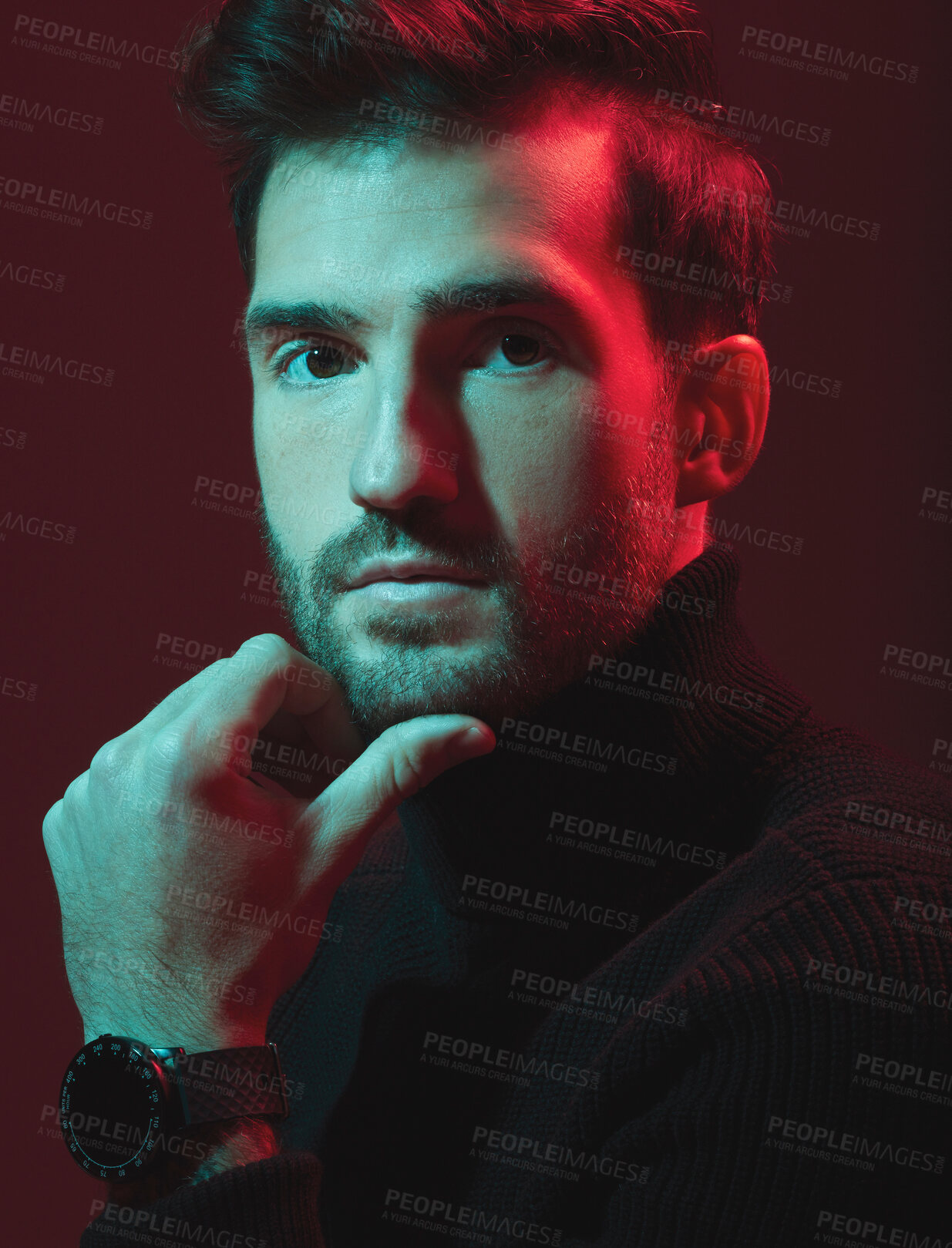 Buy stock photo Face portrait, fashion and man in studio with red light for clothes, beauty and luxury style dark background. Headshot of aesthetic model with turtle neck, watch and cosmetics as inspiration for men