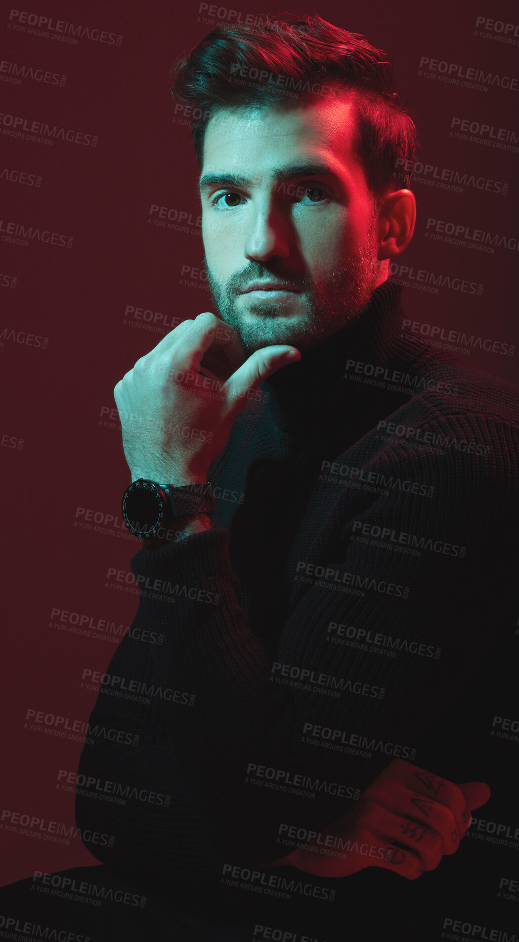 Buy stock photo Man, fashion and studio portrait with red lights for clothes, beauty and luxury style on dark background. Face of aesthetic model person with turtle neck, art and cosmetics for inspiration for men