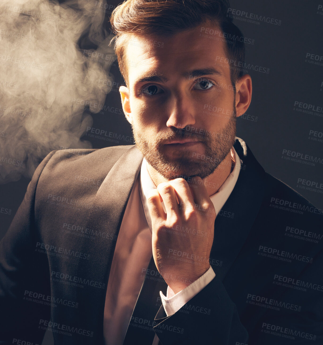 Buy stock photo Portrait, smoke and man in suit, fashion and executive with confidence on dark studio background. Face, male leader and elegant gentleman with vintage clothes, stylish outfit and smoking on backdrop